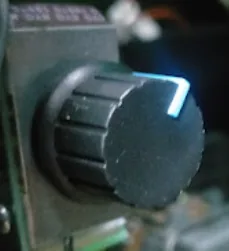 The vibration-strength potentiometer inside the pinball cabinet.